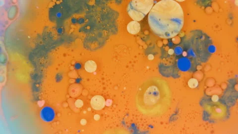 Orange and blue ink mixed with oil rotating background Stock Footage 209606947