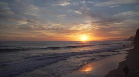 Orange and blue sky at Mesa beach Stock Footage 62433791