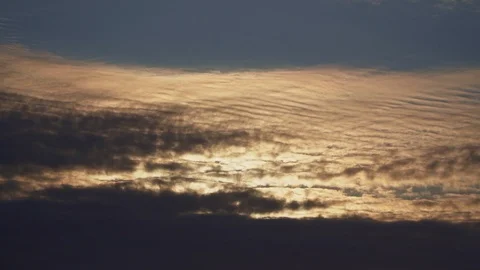 Orange and dark clouds fly in the sky Stock Footage 107850706