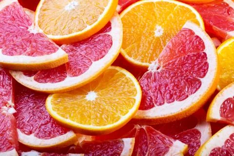 Orange and grapefruit background Stock Photos