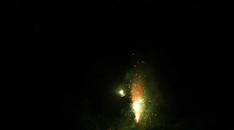 Orange and green ground firework sparks Video stock 40212946