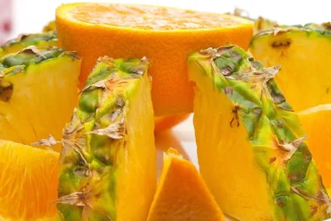 Orange and pineapple Stock Photos