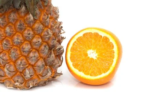 Orange and pineapple on white background Stock Photos