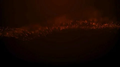 Orange and red glowing particles moving in dark space Stock Footage 333114437