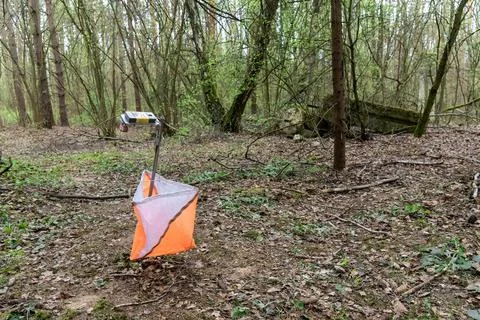 Orange and white orienteering control point flag 写真素材