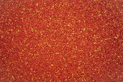 Orange and Yellow Rubber Gravel Texture Surface Stock Photos