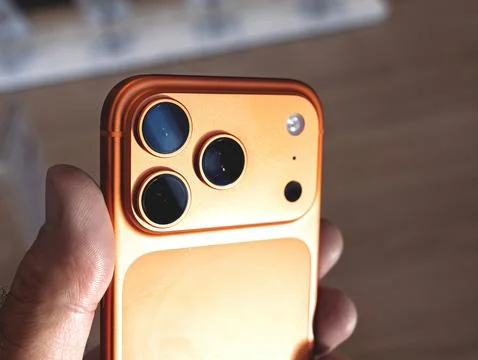 Orange Apple iPhone 17 Pro triple camera closeup Stock Photos