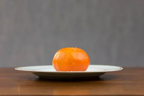 Orange assiette studio Stock Photos