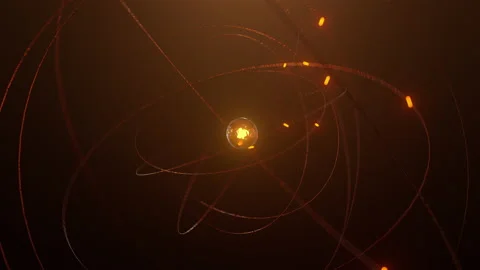 Orange atom concept shining glowing proton neutron nucleus Stock Footage 208051553