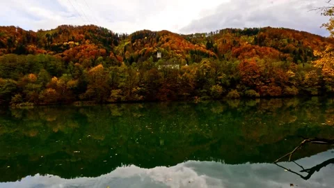 Orange autumn hills with reflection in the river Video stock 320175462