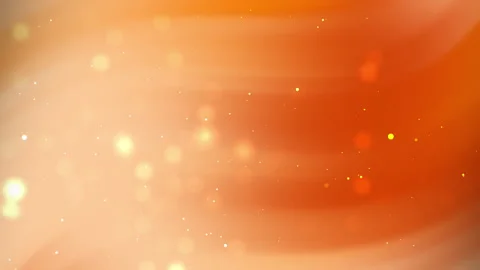 Orange background with blurred lights and small sparkles. Stock Footage 299791846