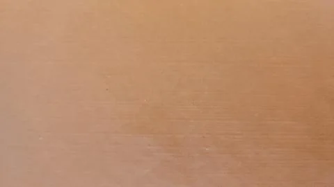 Orange background of dyed paper Stock Photos