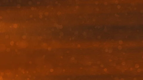 Orange background features scattering particles and blurred lights Stock Footage 295724046