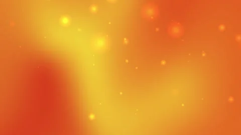 Orange background features small bright yellow glowing circles 스톡 동영상 297292421