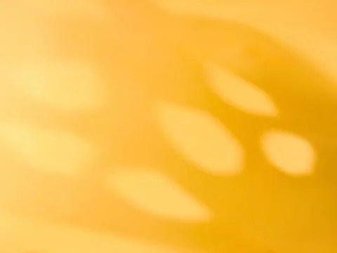 Orange background with openwork shadows Stock Photos