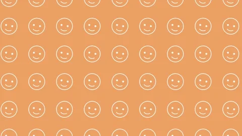 On an orange background, smiling faces from white outline. Looping background of Stock Footage 309471000