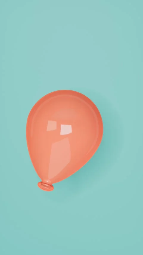 Orange balloon floating on turquoise background. 3d rendering Video stock 339933597