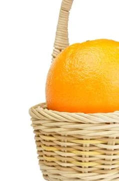 Orange in the basket Stock Photos