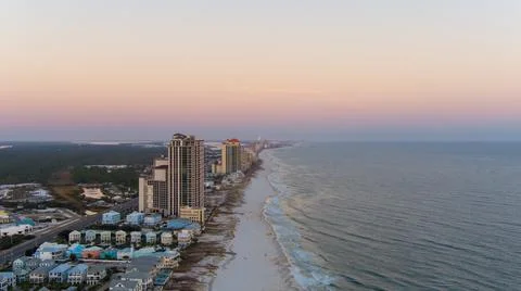 Orange Beach at sunset Stock Photos