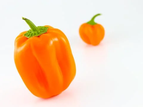 Orange bell peppers Stock Photos