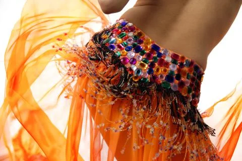Orange belly dancer Foto stock