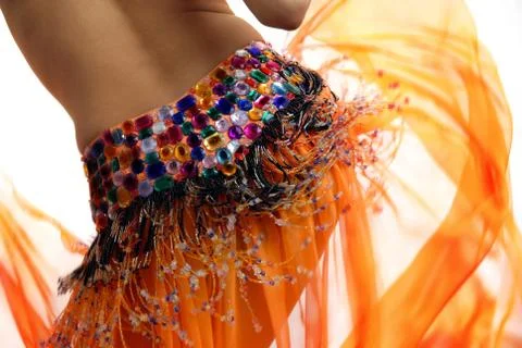 Orange belly dancer Stock Photos