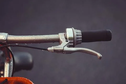 Orange bicycle handlebar Stock Photos