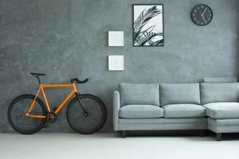 Orange bike in living room Stock Photos