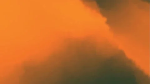 Orange, Black, and yellow-colored Smoky Multicolored wavy Pattern motion Stock Footage 170380215