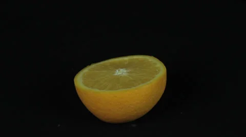 Orange on black background Stock Footage 35437901