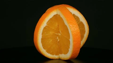 Orange on a black background. Stock Footage 147749625