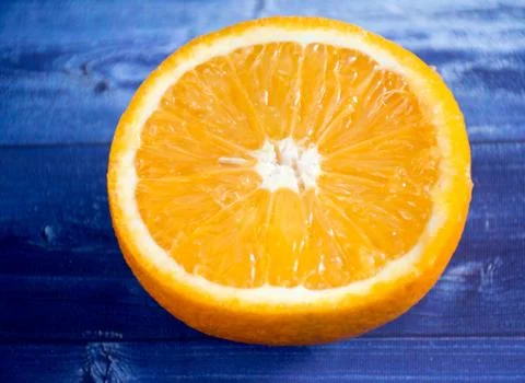 Orange on a black background Stock Photos