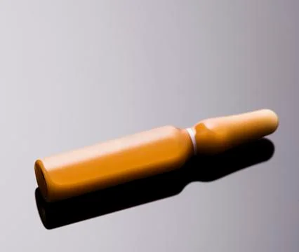 Orange blisters with gray background Stock Photos