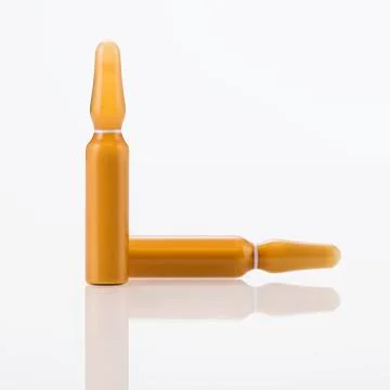Orange blisters with white background Stock Photos