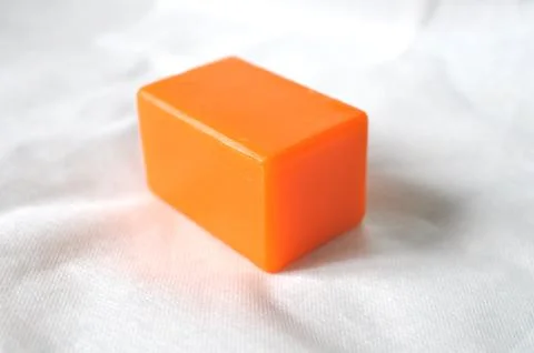 Orange block of bar soap Stock-Fotos