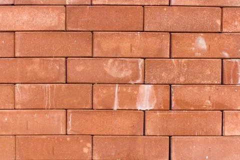 Orange block wall could be used for background texture Stock Photos