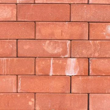 Orange block wall could be used for background texture Stock Photos