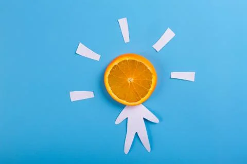 Orange on blue background Stock Photos