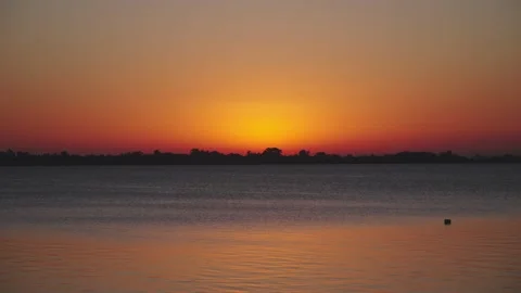 Orange blue sunset lake Видео 164500663