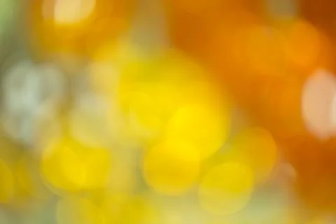 Orange blurred bokeh background texture Stock Photos