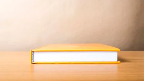 Orange book Stock Photos