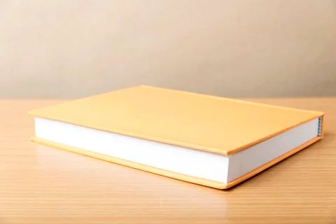 Orange book Stock Photos