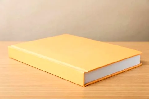 Orange book Stock Photos