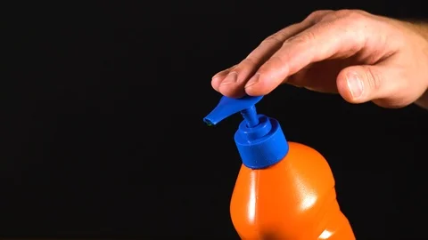 Orange bottle of detergent. Bottle without labels and name. Video stock 124659533