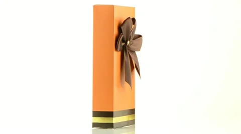 Orange box with gold bow Vídeo Stock 20500325