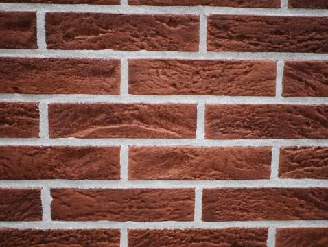 Orange brick facade. Torn stone texture. Stone wall. abstract background Foto stock