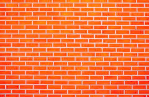 Orange brick wall background, Building wall background Stock Photos