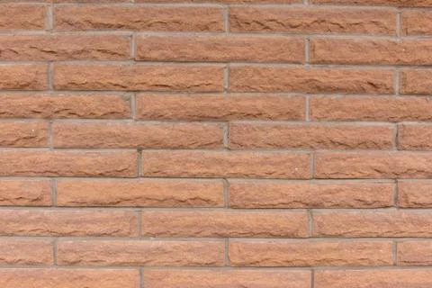 Orange brick wall background. Stock Photos