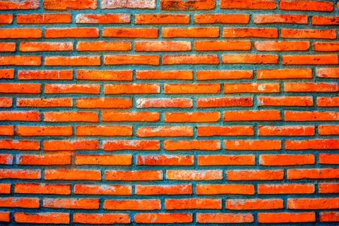 Orange brick wall background Stock Photos