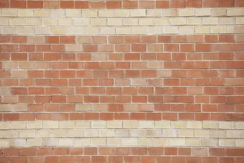 Orange brick wall background Stock Photos